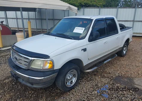 2003 Ford F-150 Lariat/Xlt z USA, uszkodzony, nr VIN 1FTRW07633KD71565
